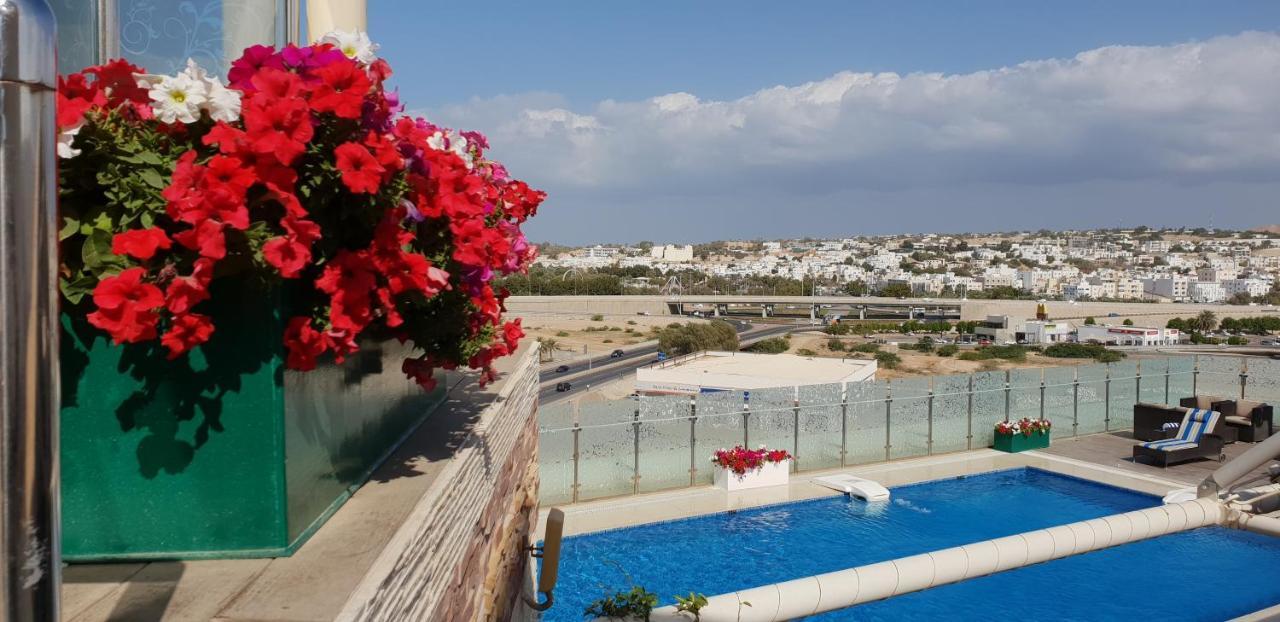 Coral Muscat Hotel And Apartments Bagian luar foto
