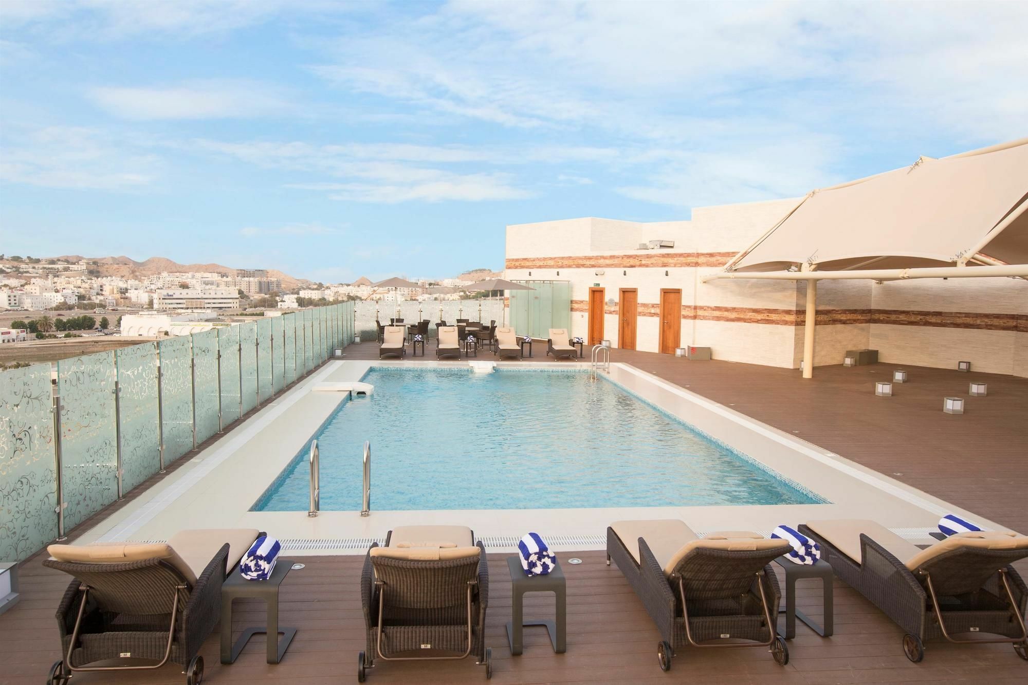 Coral Muscat Hotel And Apartments Bagian luar foto